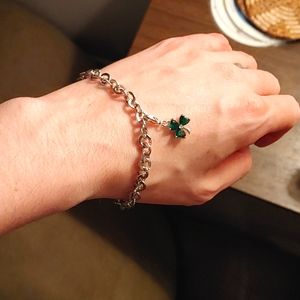 7.5" charm bracelet with 1" extender. 1 shamrock charm included.  Crystal or cz.
